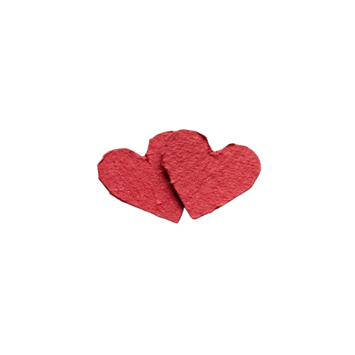 Two red paper hearts touching each other against a black background
