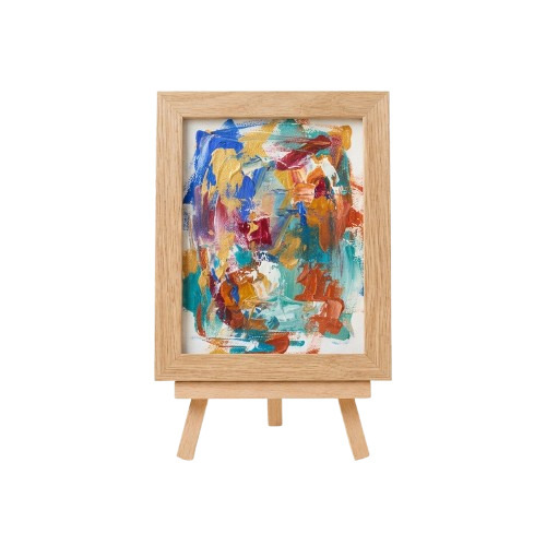 A wooden easel holding a framed abstract painting with vibrant splashes of blue, orange, red, and yellow colors