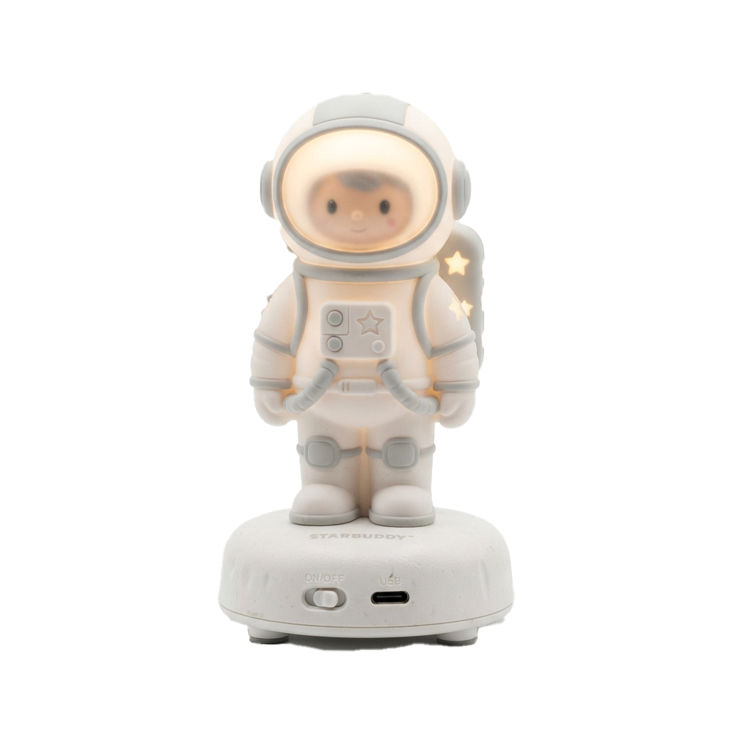 Glowing astronaut toy figure standing on a round base with illuminated details and stars on the suit