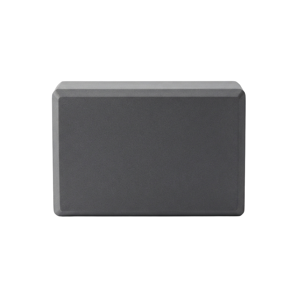 A plain gray rectangular object with rounded edges against a black background