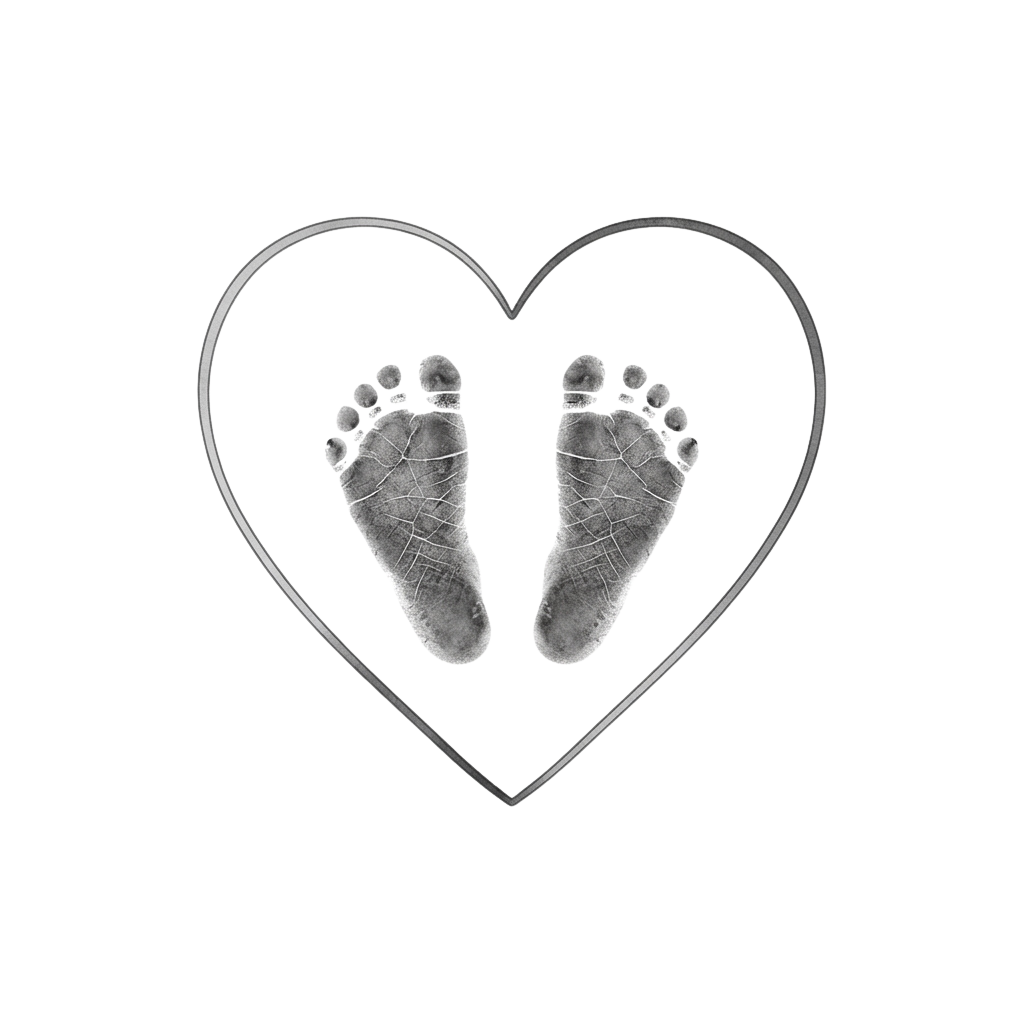Two baby footprints forming a heart shape against a black background