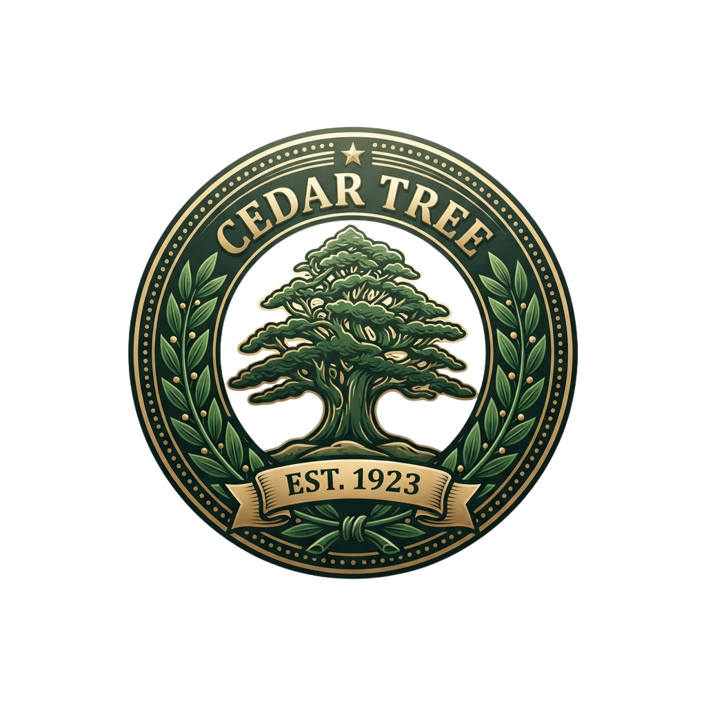 A circular emblem featuring a cedar tree illustration, surrounded by leaves, with the text Cedar Tree and Est. 1923