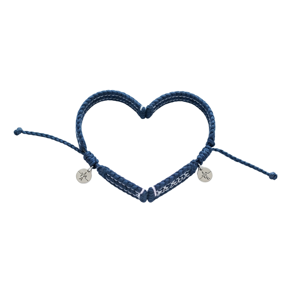 A heart-shaped braided bracelet in navy blue with two small metallic charms attached at the bottom