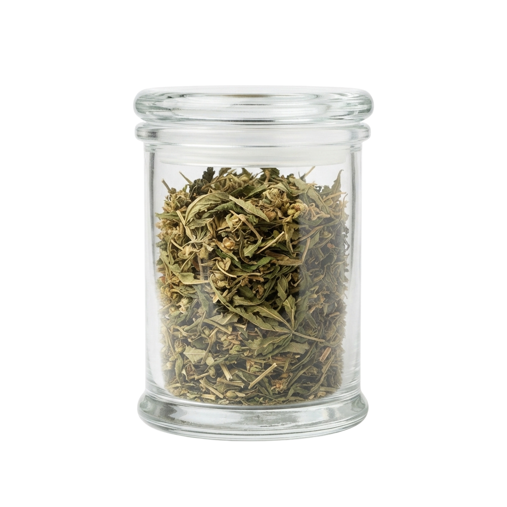 A clear glass jar with a metal lid filled with dried herbs and leaves