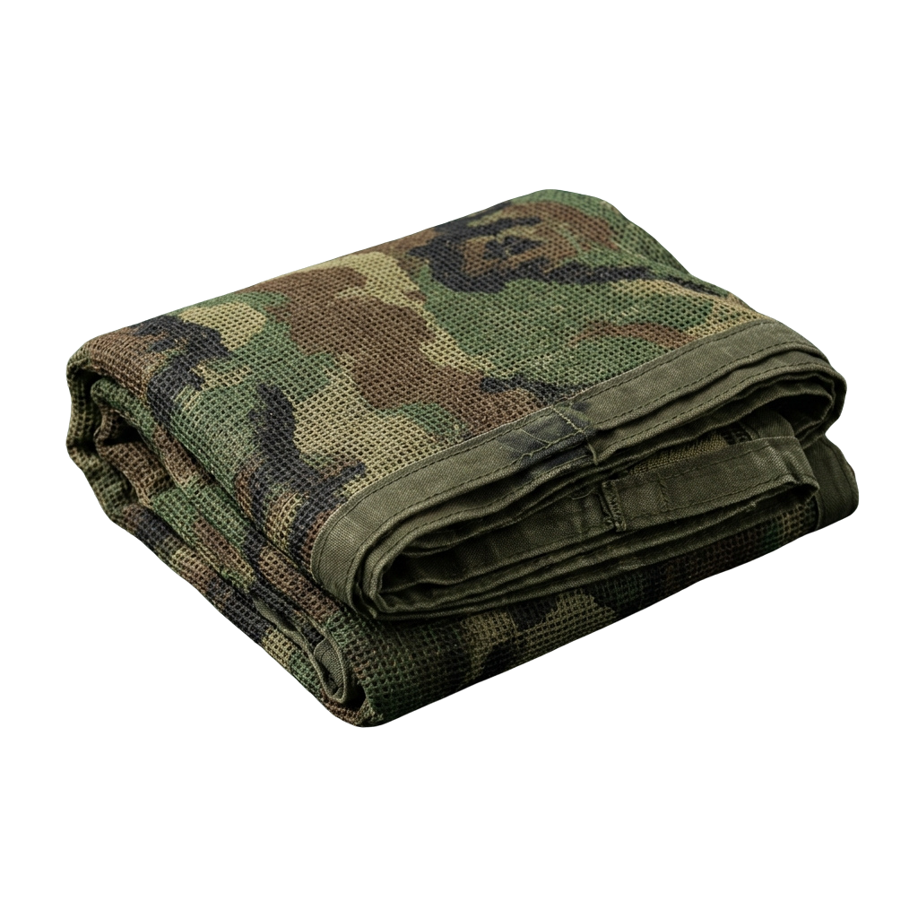 A folded camouflage-patterned mesh blanket shown against a black background