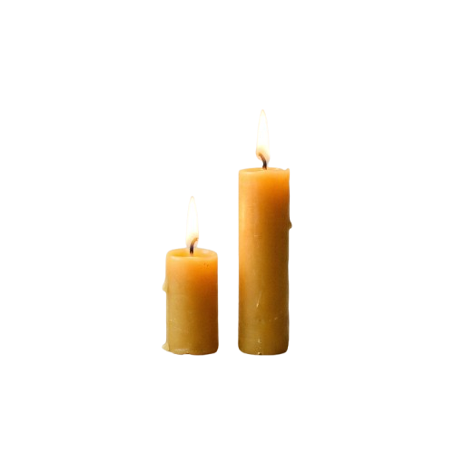 Two lit candles of different heights burning against a black background