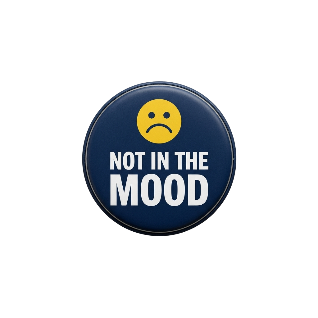 Round blue sticker with a yellow sad face emoticon and white text reading Not in the Mood