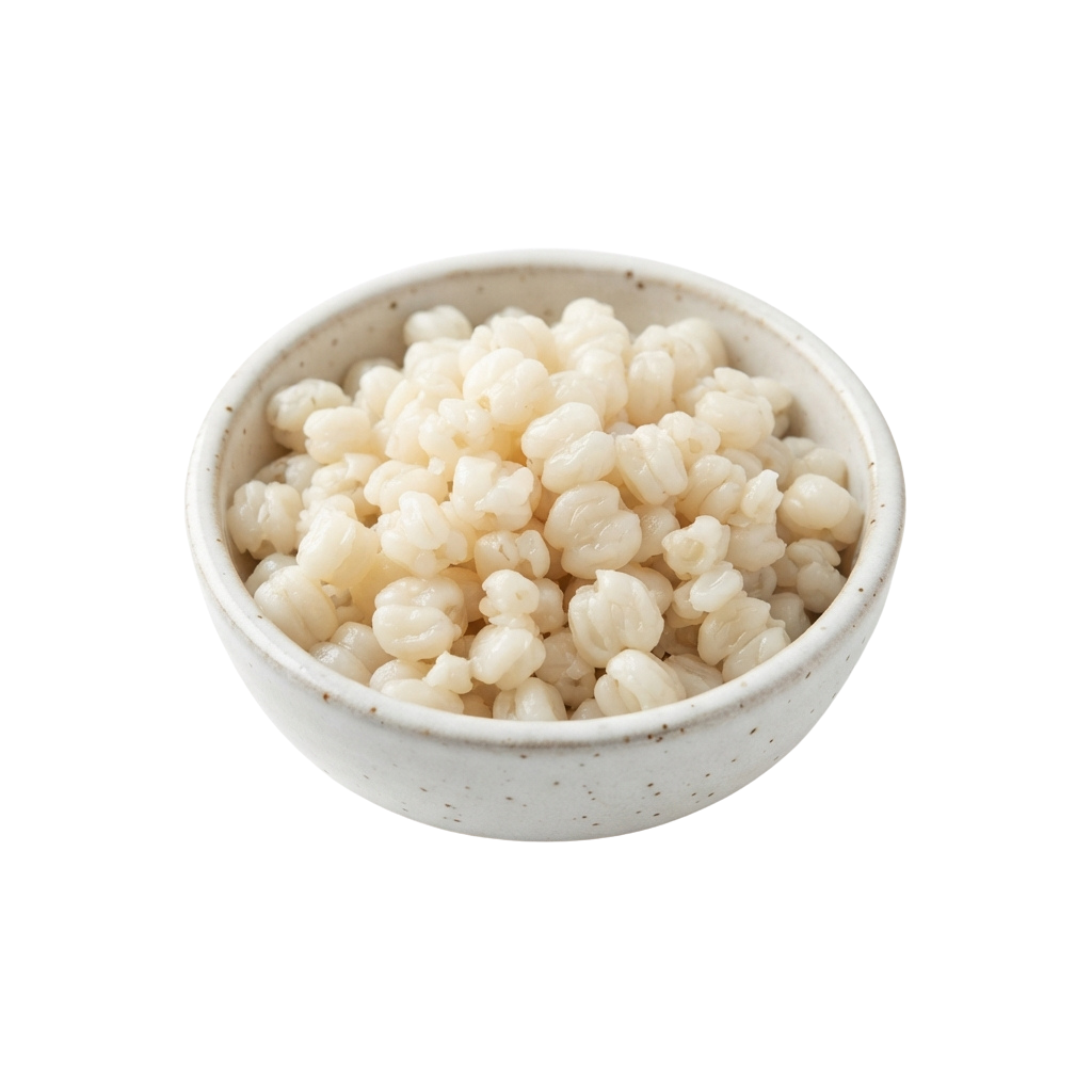 White bowl filled with small, round, light-colored popped corn or pearls