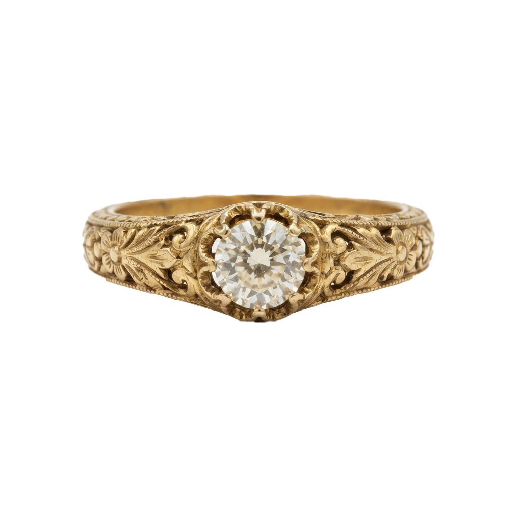 A vintage-style gold ring featuring a round solitaire diamond set in intricate floral filigree detailing.