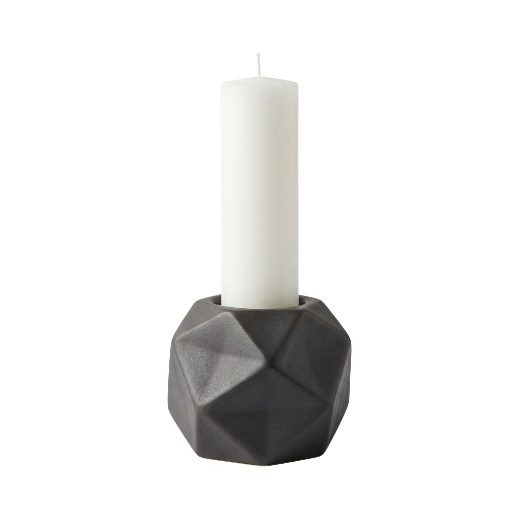 A sleek gray geometric candle holder with a white pillar candle inside