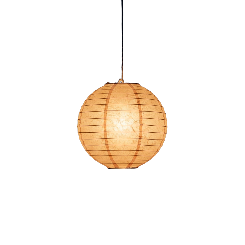 A glowing paper lantern hanging from a black ceiling against a dark background