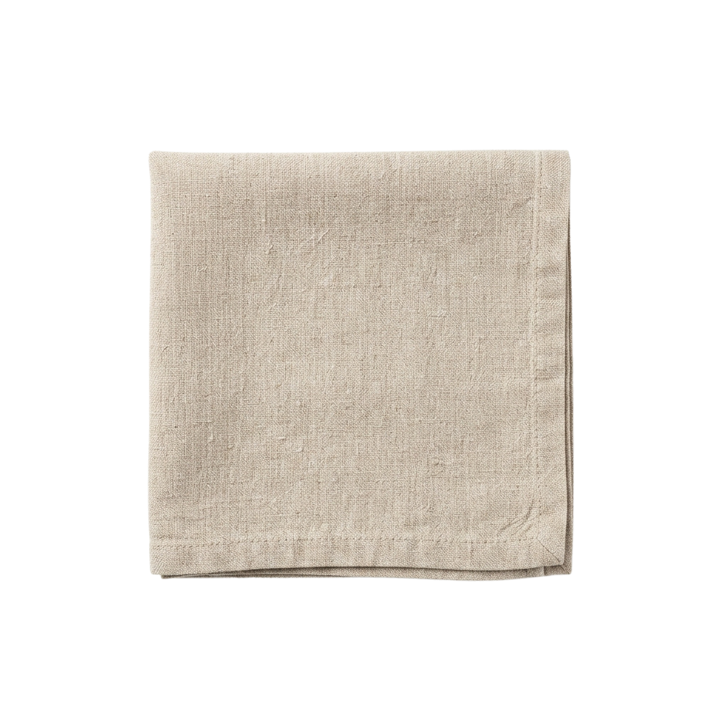 A neatly folded square of light beige linen fabric against a black background