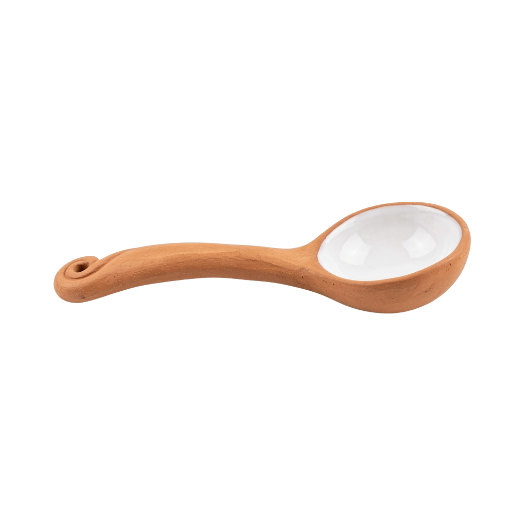 A terracotta-colored spoon with a curved handle and an oval-shaped bowl.