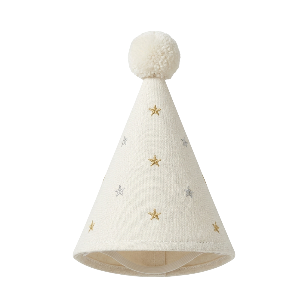 A white party hat with gold and silver star embroidery and a fluffy white pom pom on top