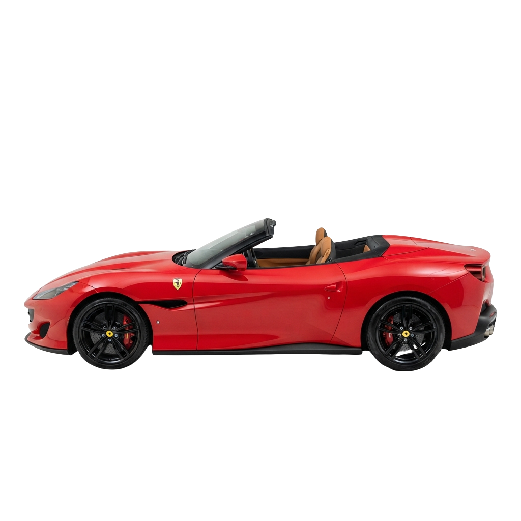 Side view of a red convertible sports car with black rims and tan interior visible through the windshield
