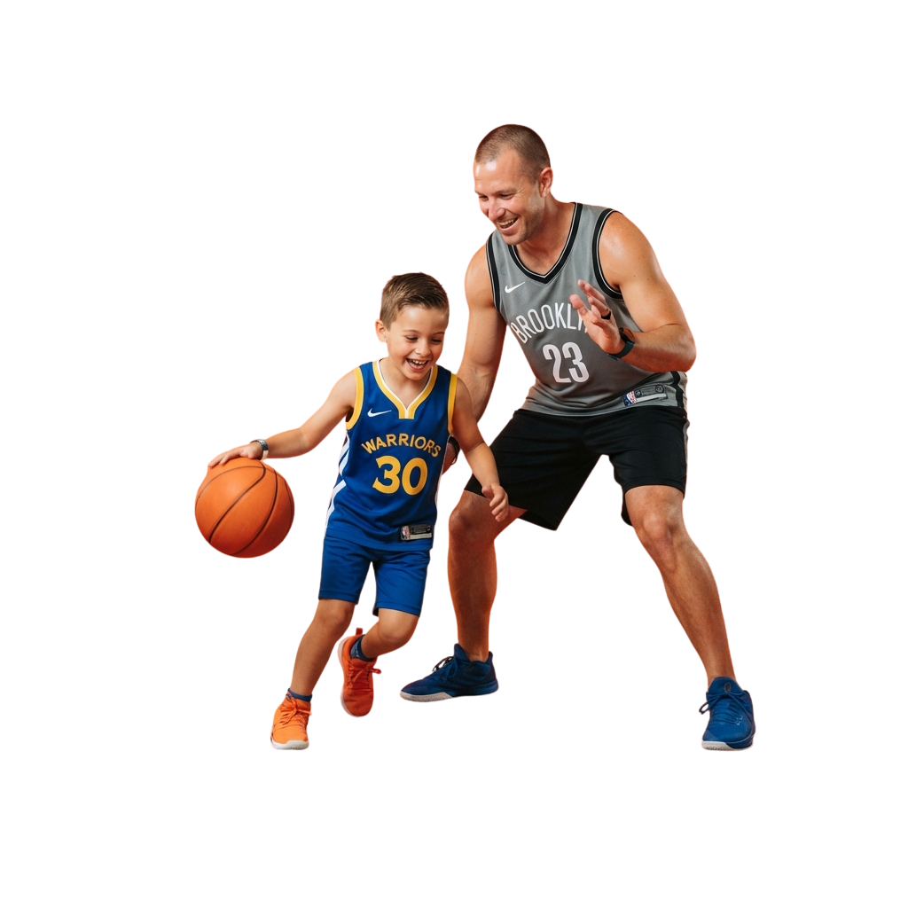 An adult in basketball uniform assisting a young boy holding a basketball