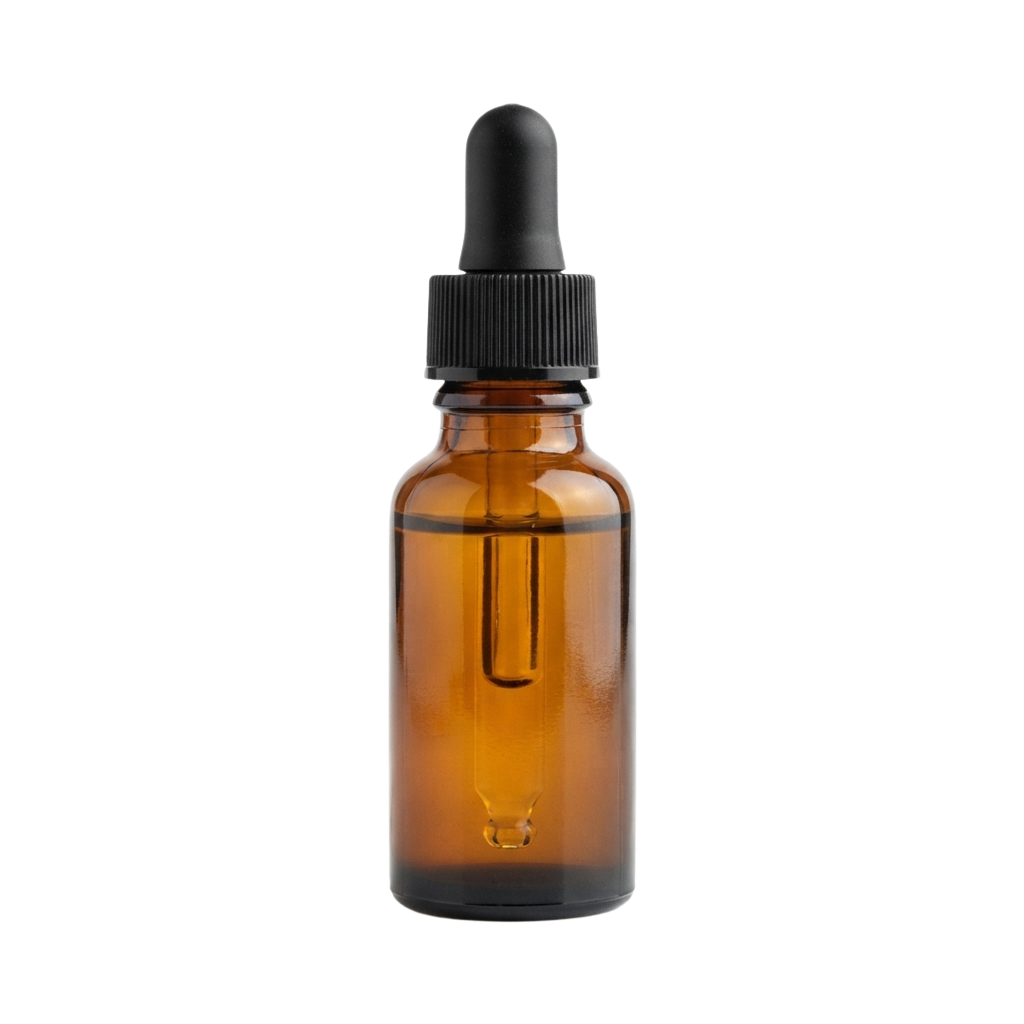 Amber glass dropper bottle with black dropper cap against a dark background