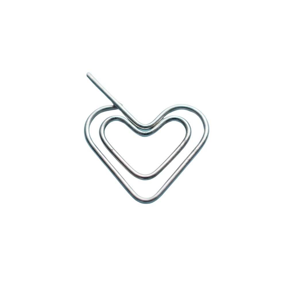 A silver paperclip bent into a heart shape with a small loop at the top.
