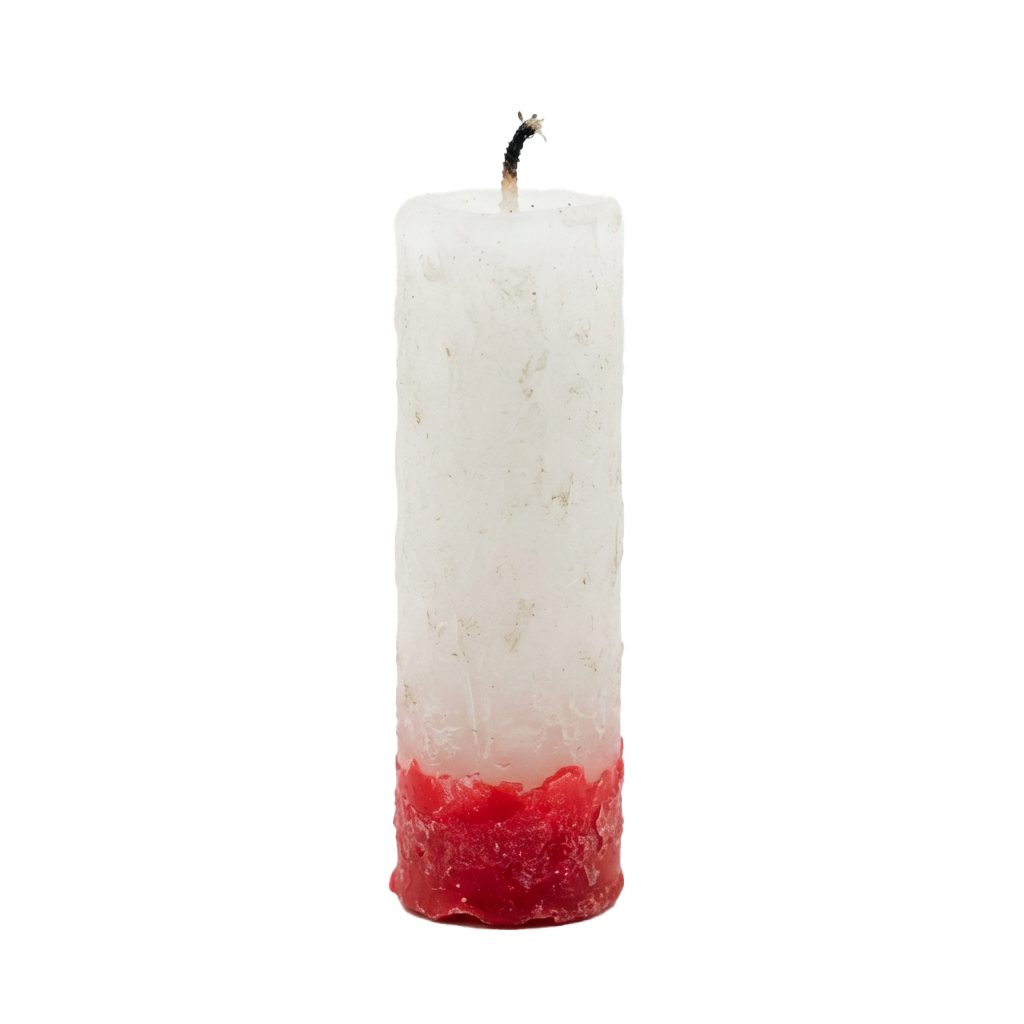 A cylindrical candle with a white top and a red gradient base, unlit with a wick on top