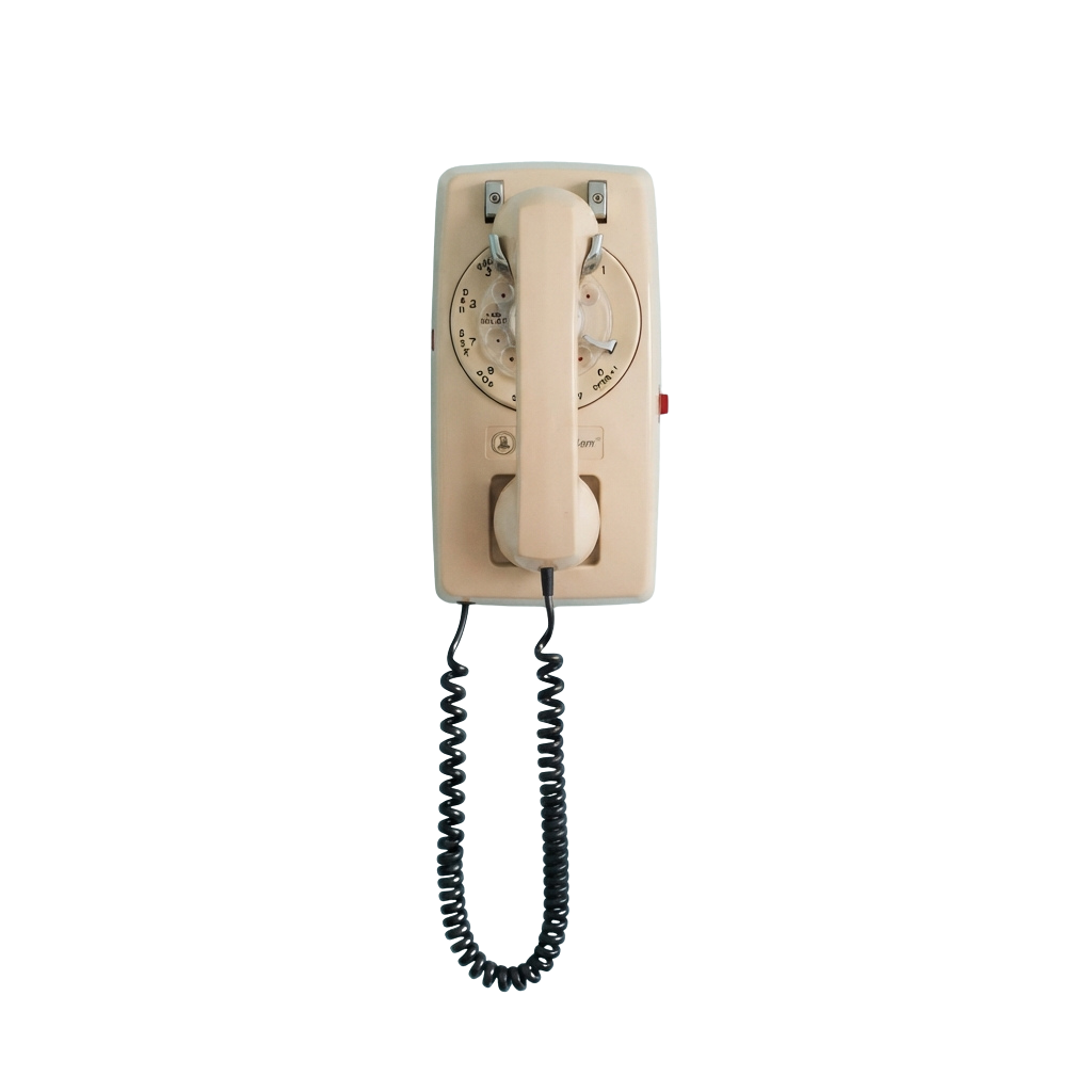 A cream-colored vintage wall phone with a coiled cord and rotary dial.