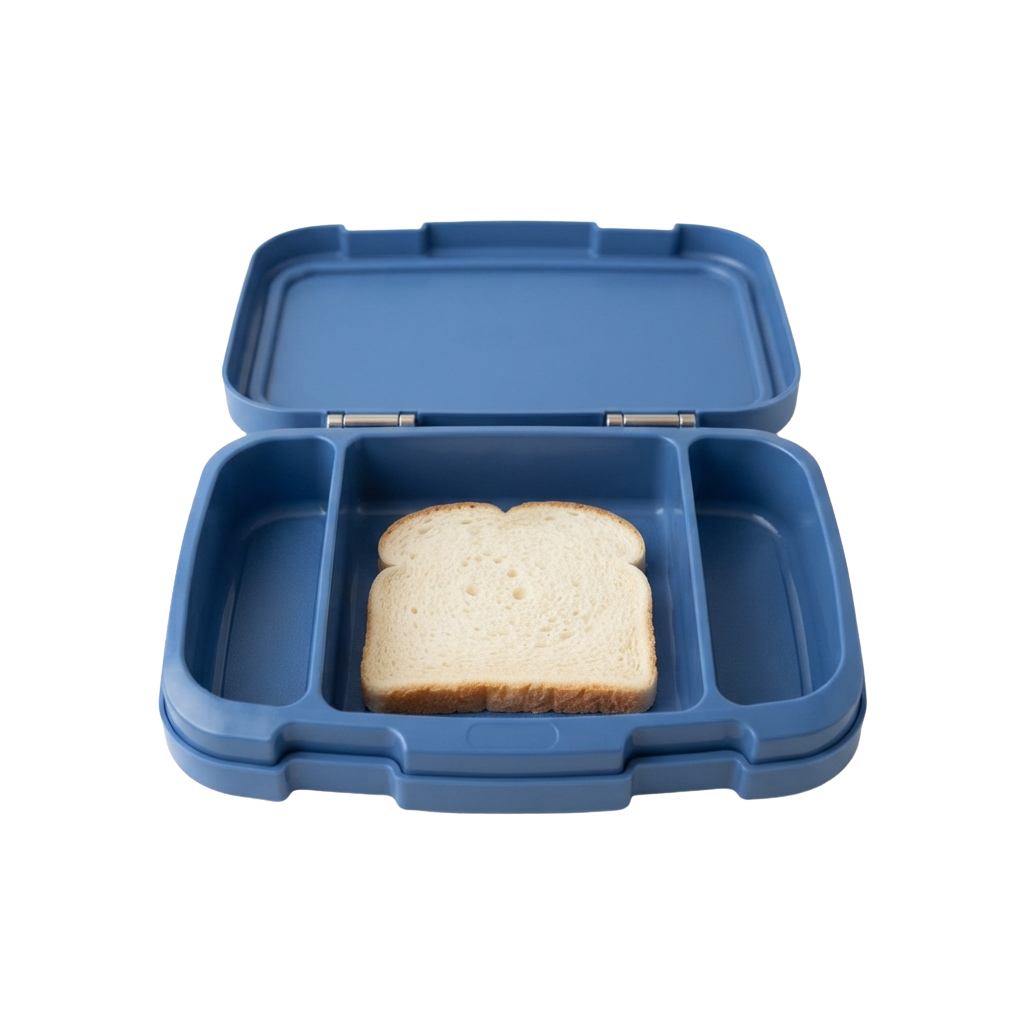 A blue plastic divided lunch container holding a single slice of white bread