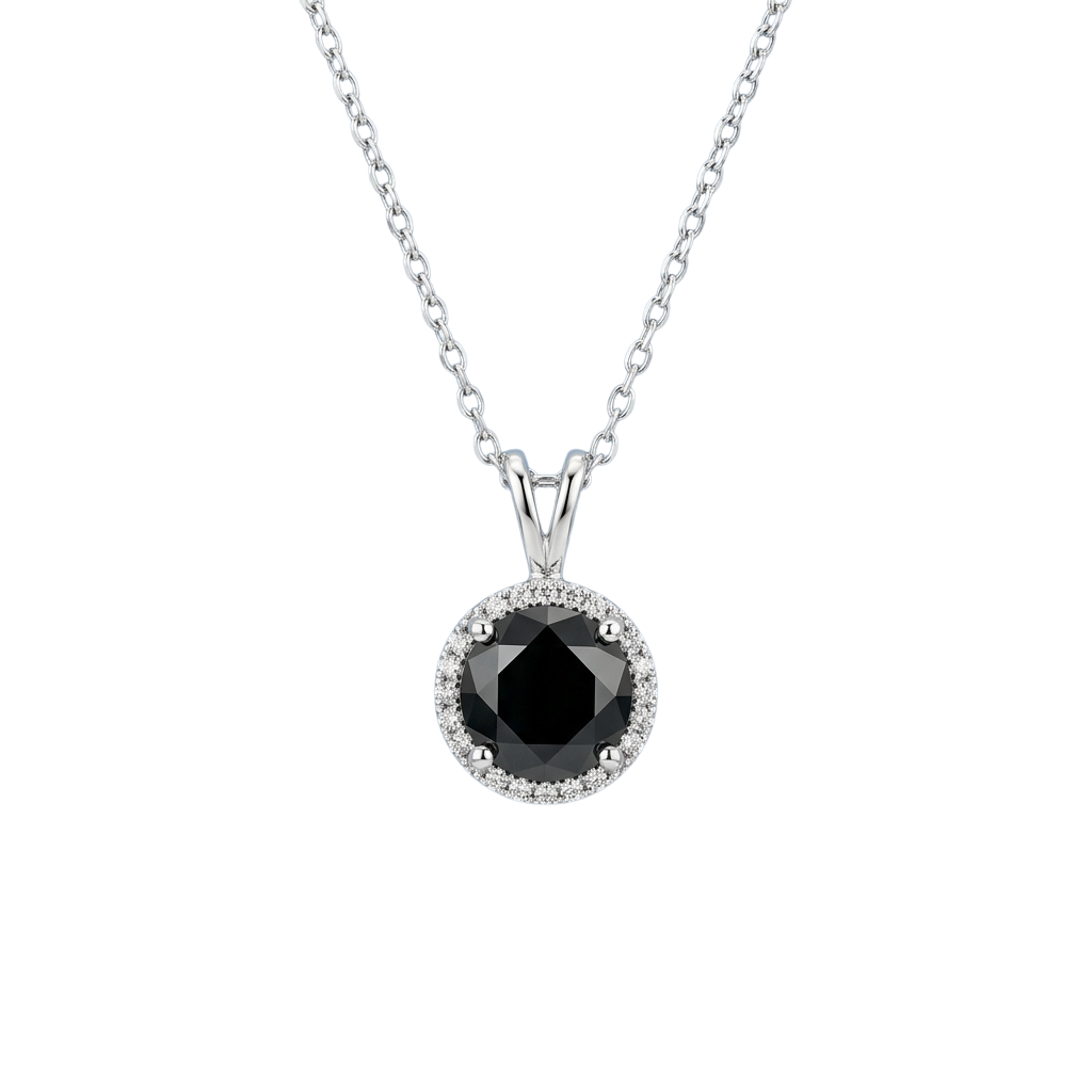 A silver chain necklace with a round black gemstone centerpiece surrounded by small diamonds in a halo setting