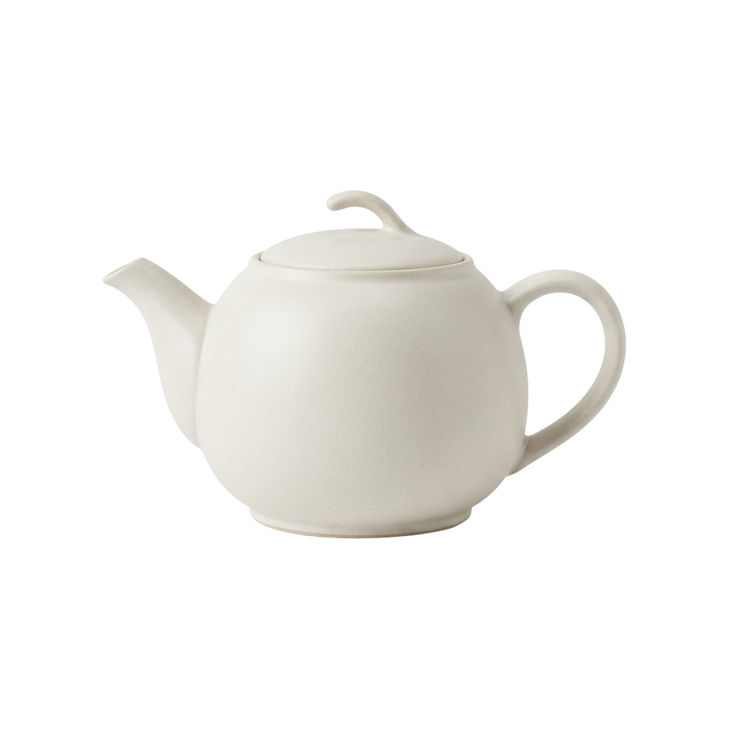 A white ceramic teapot with a lid, spout, and handle against a black background