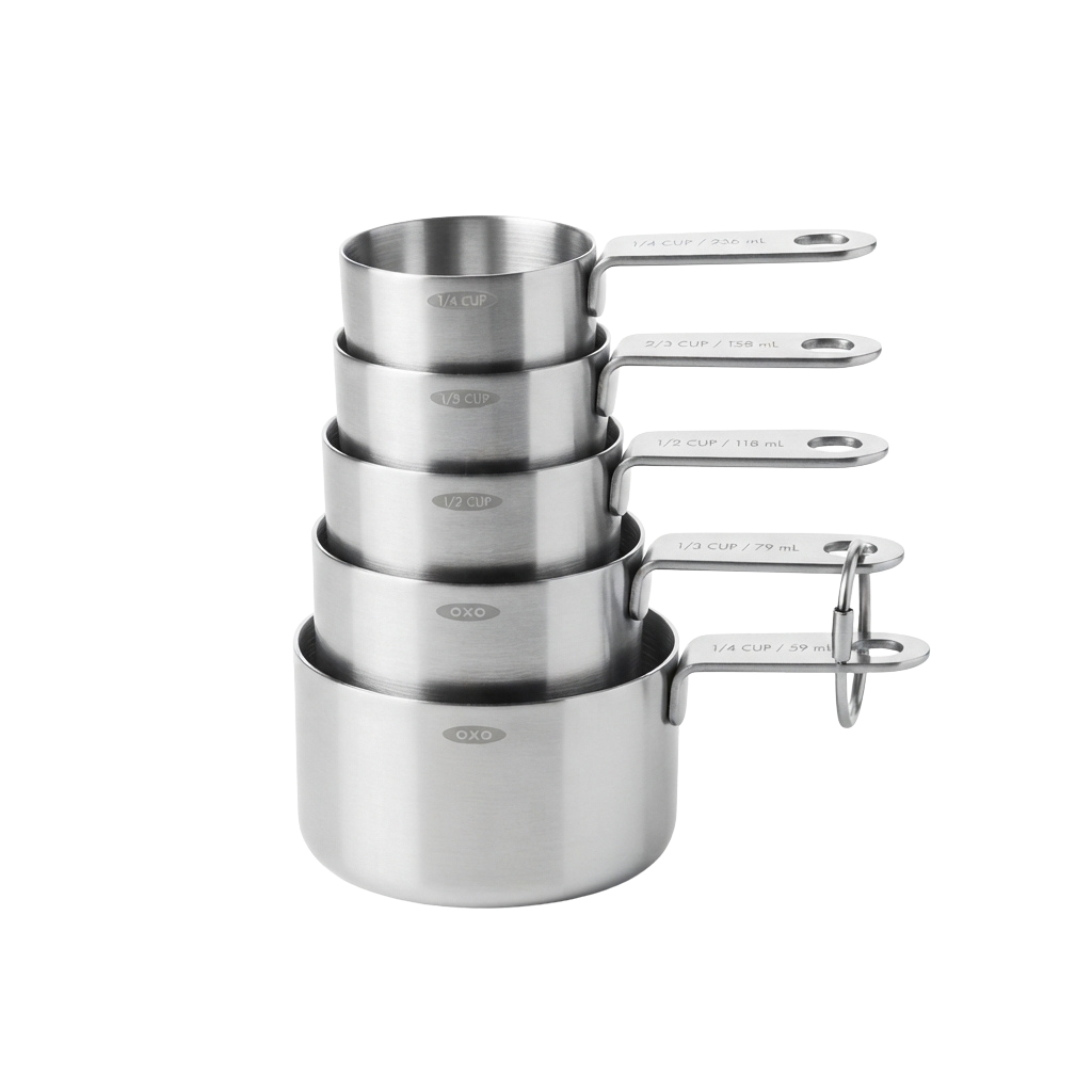Five stainless steel measuring cups stacked with measurements in cups and milliliters, each featuring a handle for easy pouring.