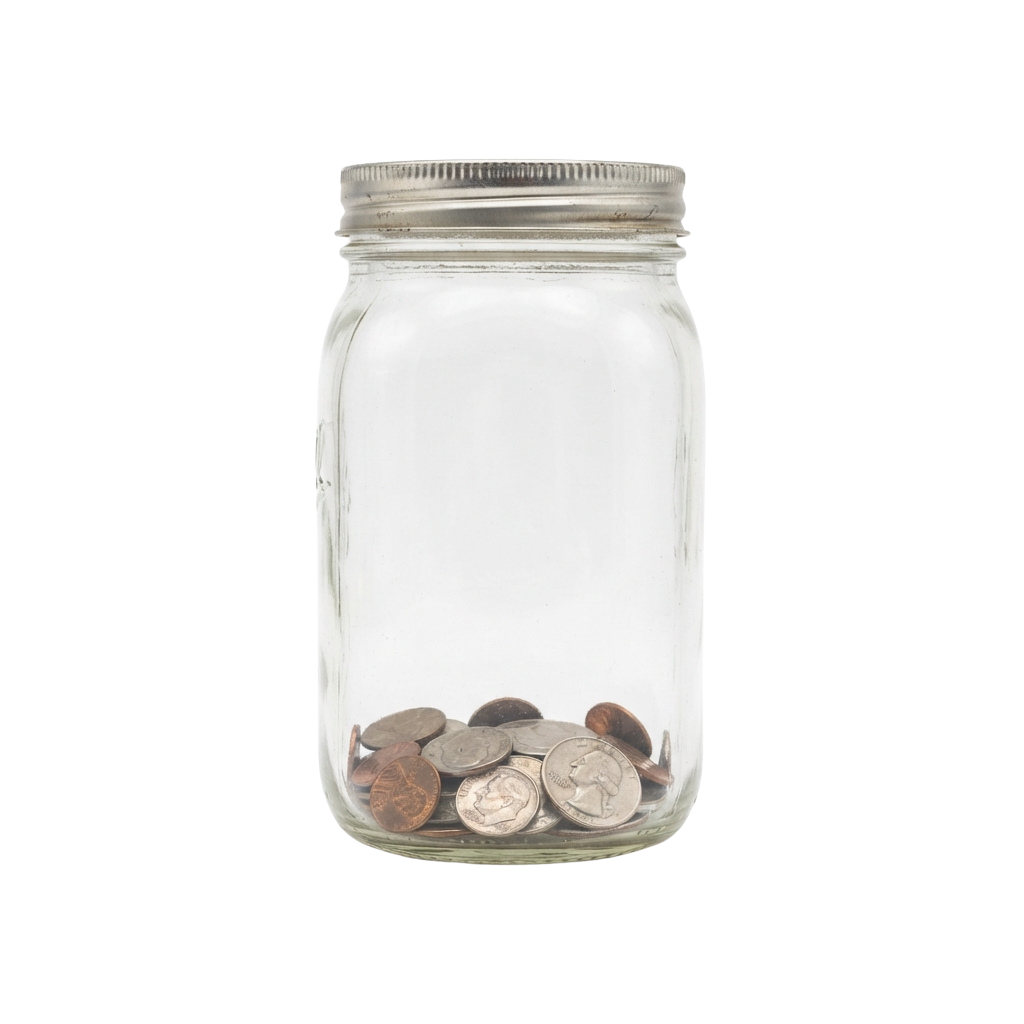 A clear glass jar with a metal lid containing various loose coins at the bottom