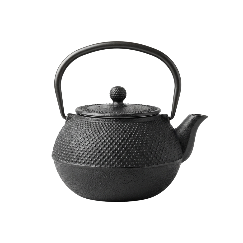 A black cast iron tea kettle with a handle, lid, and decorative knobs.