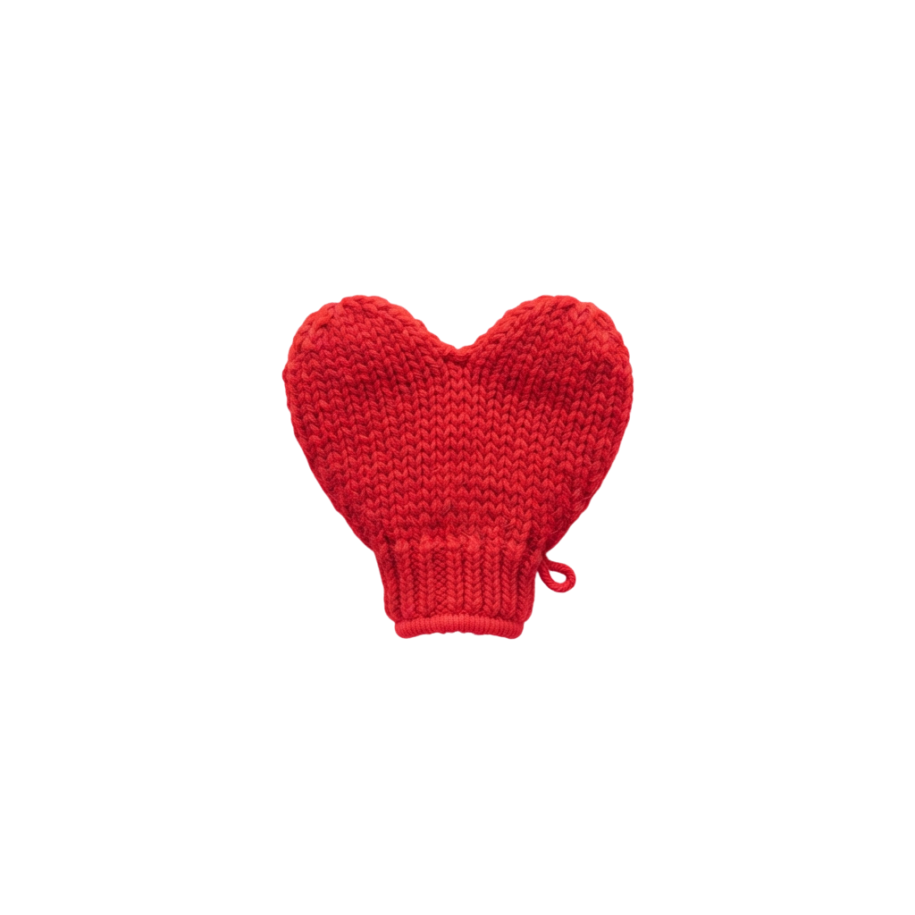 A pair of red knitted fingerless mittens hanging from a dark blue sweater sleeve with a carabiner clip.