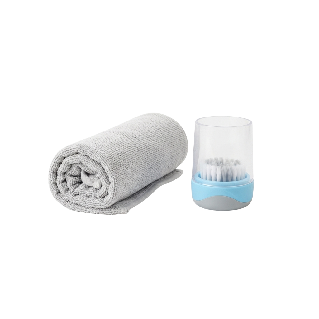 White interdental brush next to a clear toothbrush holder with blue base