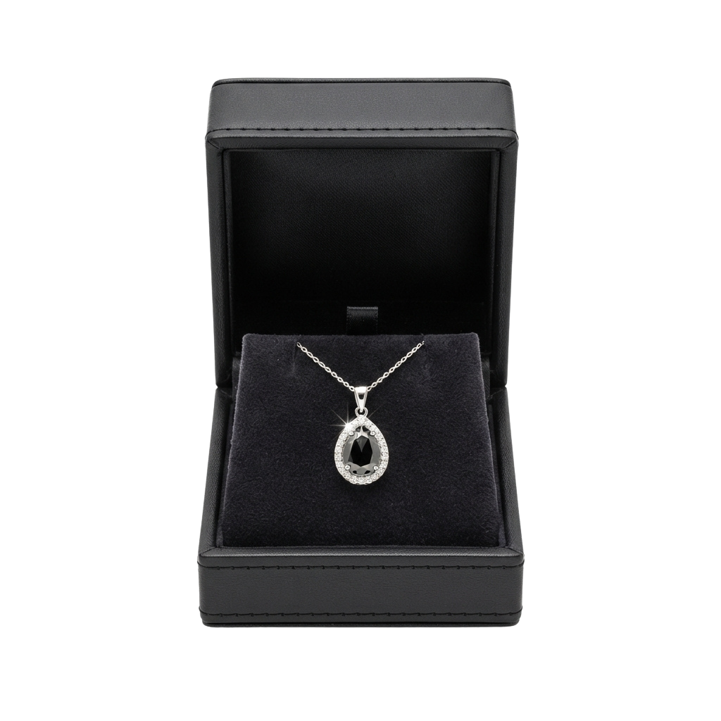 A heart-shaped diamond pendant necklace displayed in an open black velvet jewelry box