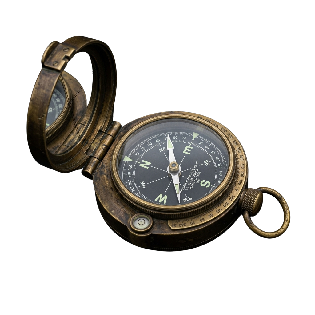 An open vintage brass pocket compass with a detailed directional dial and degree markings.