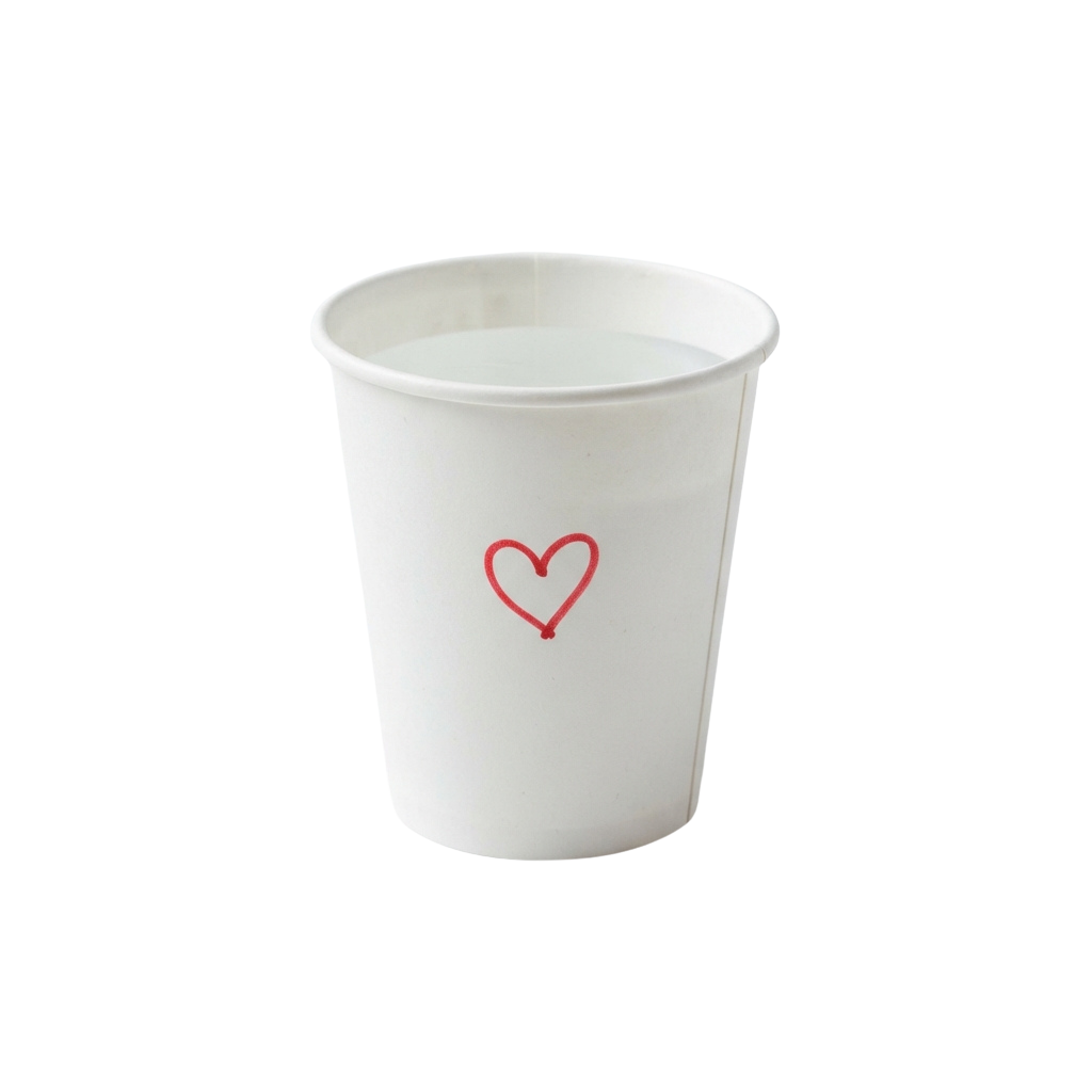 A white disposable cup featuring a small red heart symbol on its side