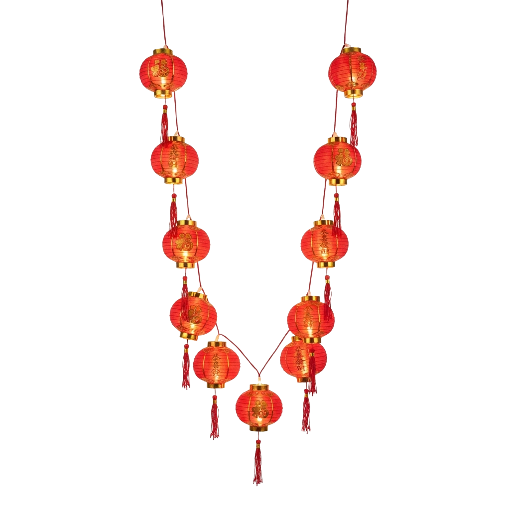 String of red lanterns with gold trim and tassels hanging against a dark background