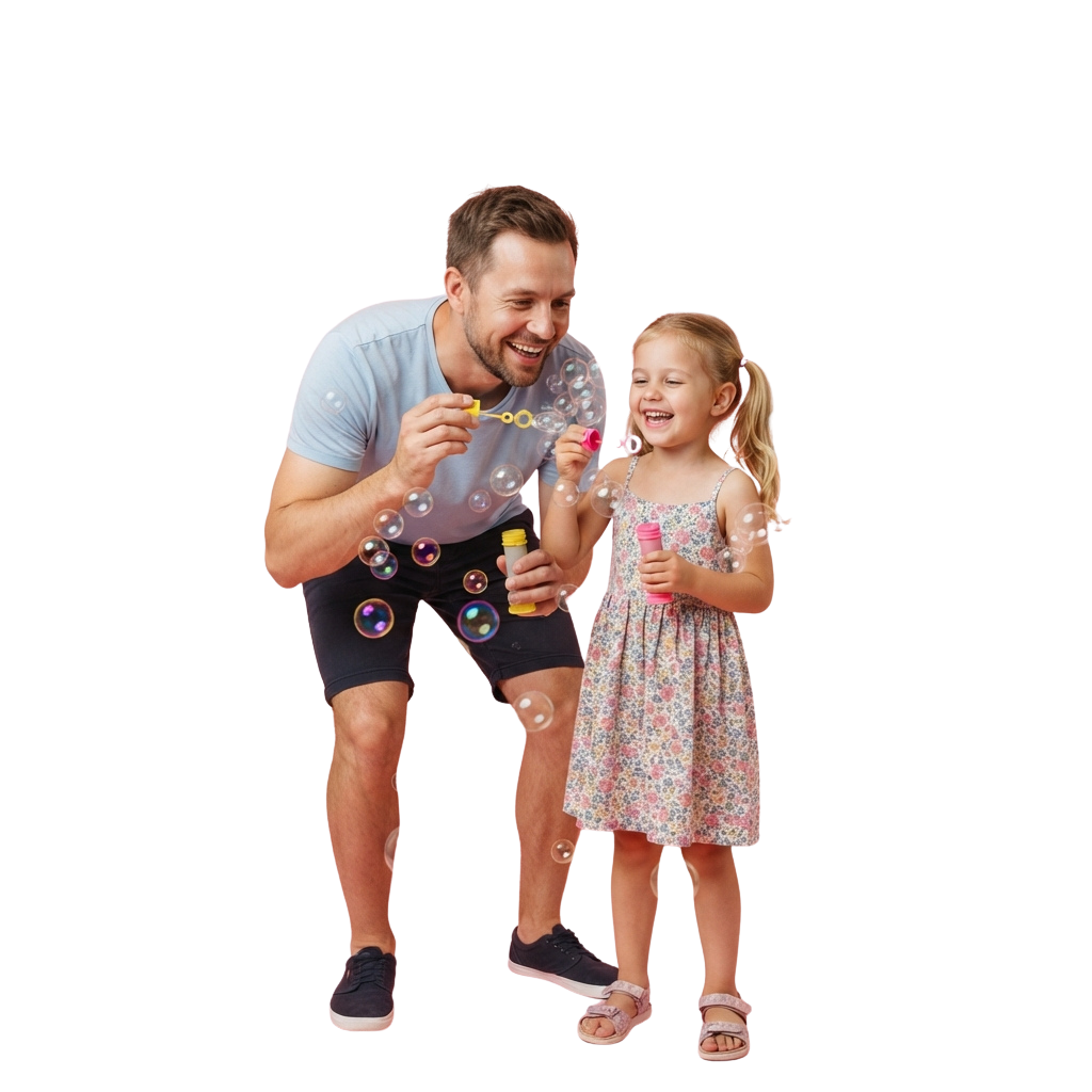 A man and a young girl smiling while blowing bubbles with wands