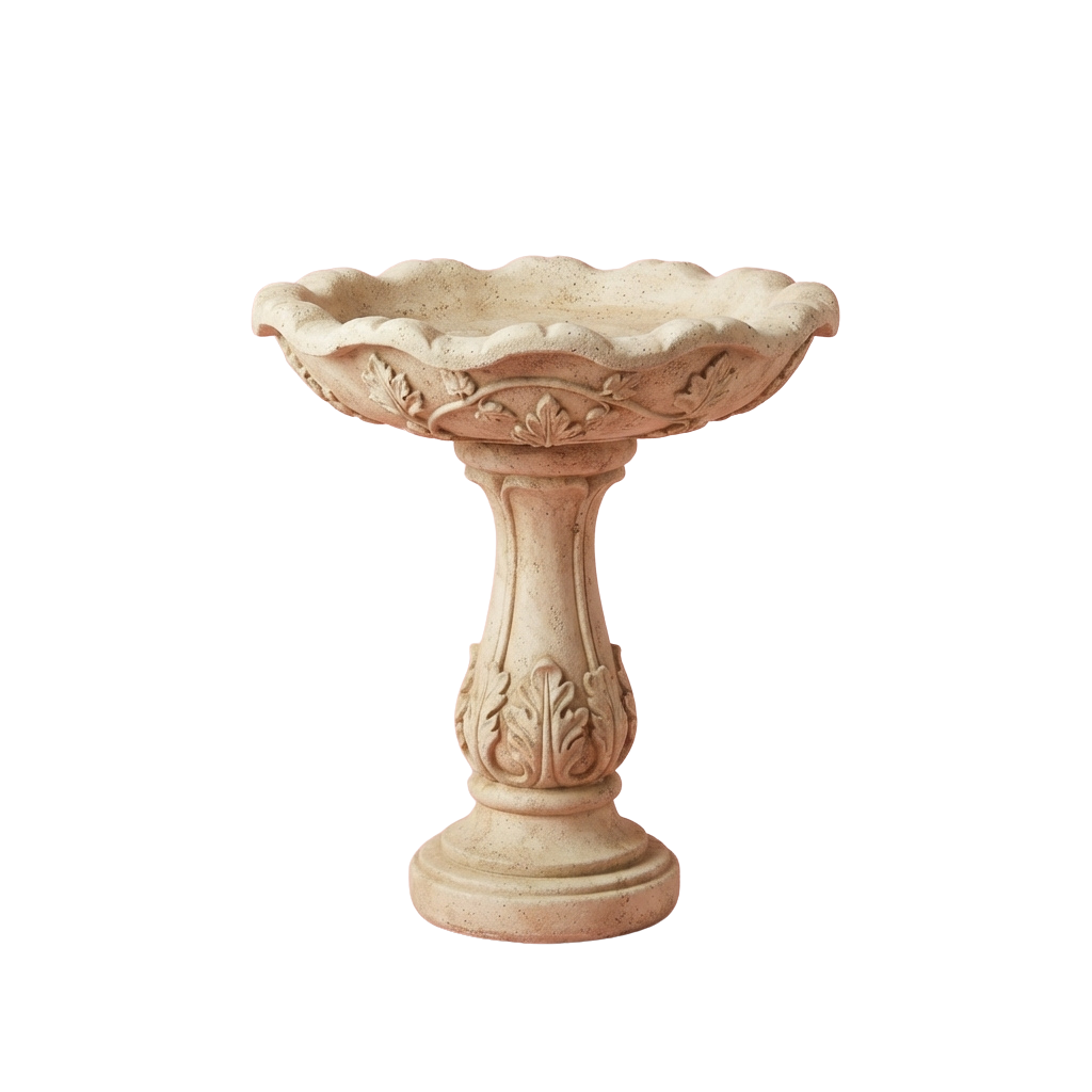 A light-colored stone pedestal basin with scalloped edges and decorative leaf carvings