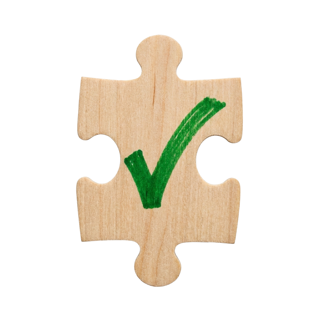 A wooden puzzle piece with a green check mark drawn on it against a black background