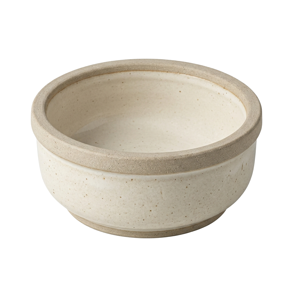 A light beige ceramic bowl with a smooth, speckled finish and a simple, rounded shape