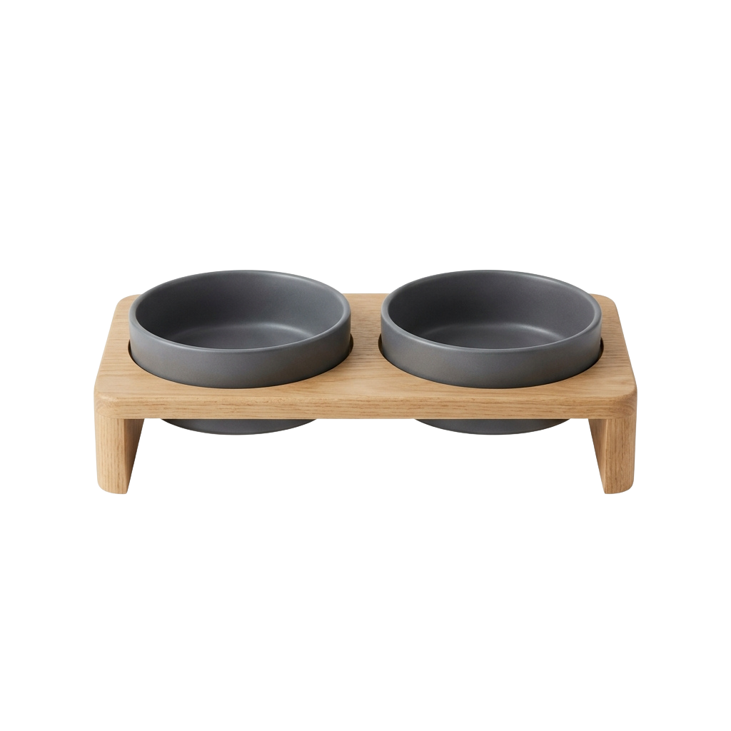 Two gray ceramic pet bowls placed on a light wooden elevated stand