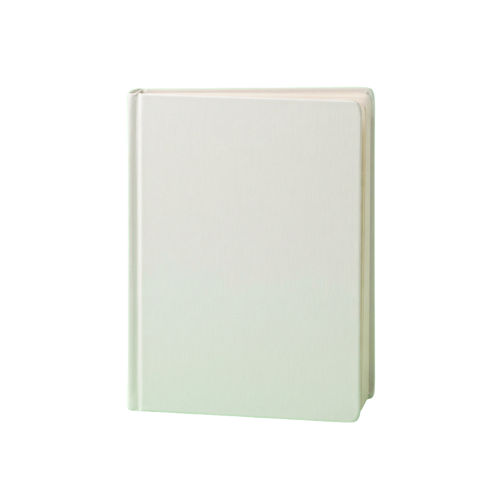 A light cream-colored blank notebook or journal with a smooth cover standing upright against a black background