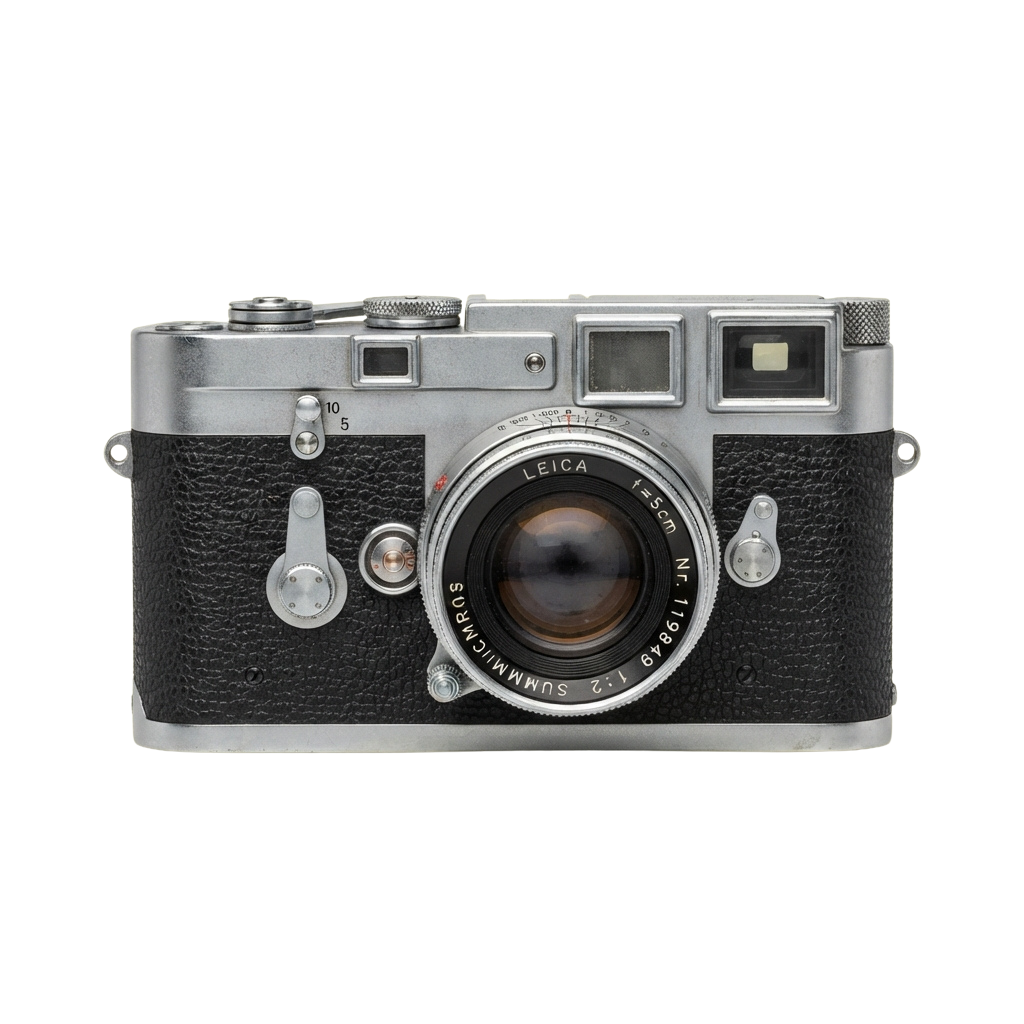 Vintage silver and black Leica rangefinder camera featuring a large lens and classic design elements