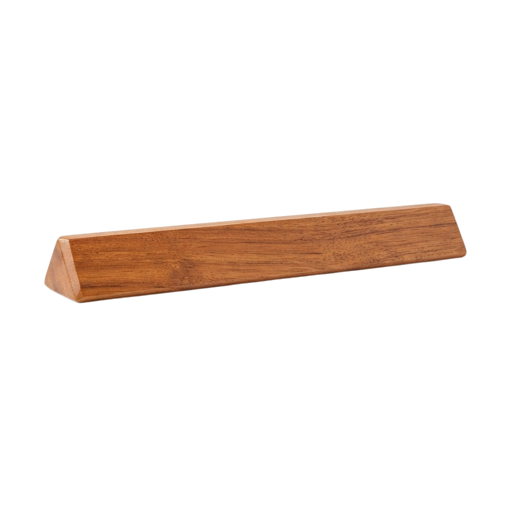 A light brown wooden spatula rest with a triangular end and smooth surface