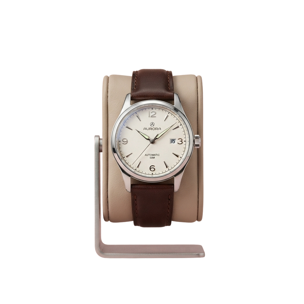 Automatic wristwatch with a white face and brown leather strap displayed on a stand