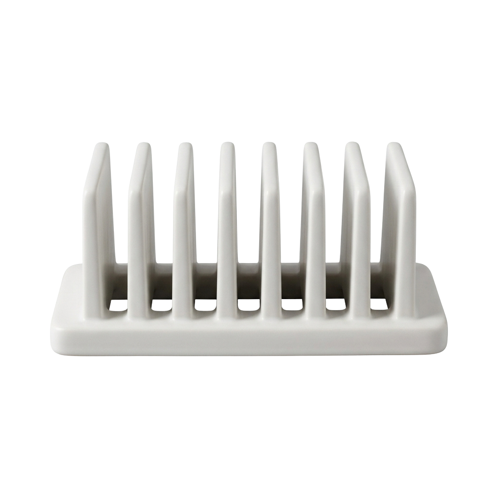 A white plastic toothbrush holder with ten slots for organizing toothbrushes