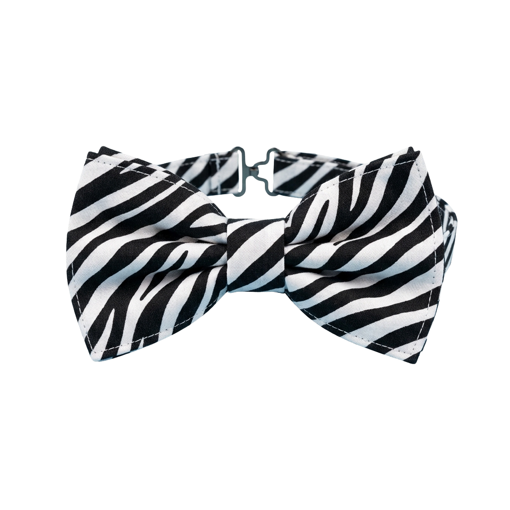 A black and white zebra print bow tie laid flat against a black background