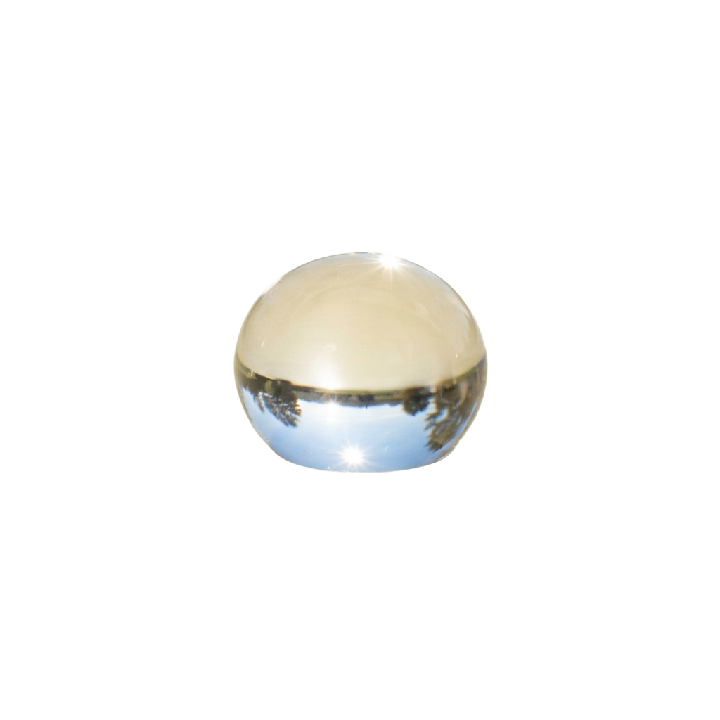 A reflective, glossy spherical object against a black background.