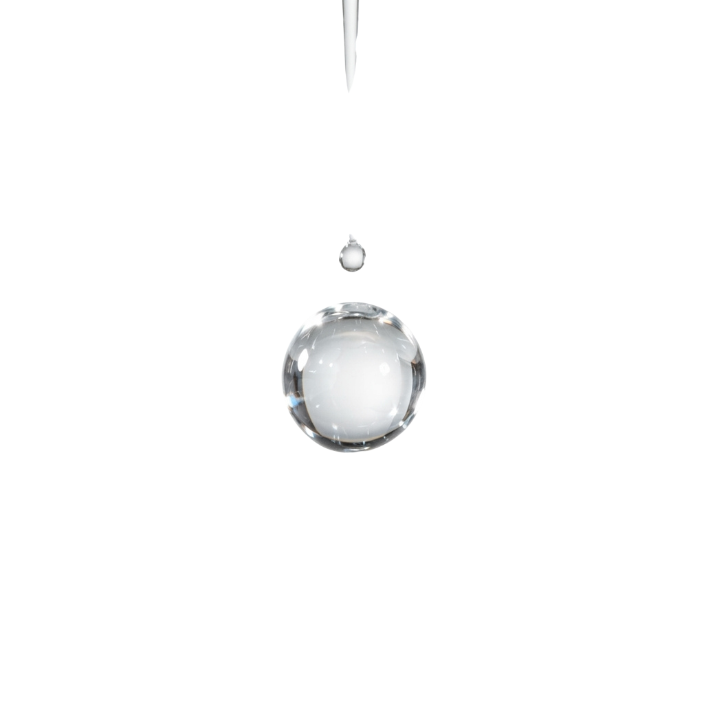 A single water droplet hanging and another small droplet falling against a dark background