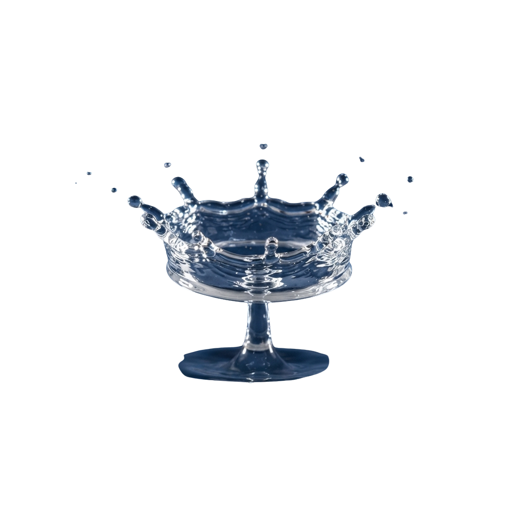 A droplet of water splashing into a glass bowl creating a crown-like splash pattern